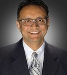 Headshot of Sam Thomas, real estate agent