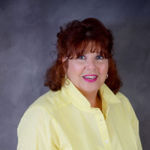 Headshot of Denise Barker, real estate agent