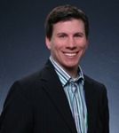Headshot of Travis Anderson, real estate agent