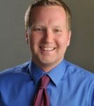 Headshot of Jordan Kennedy, real estate agent