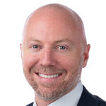 Headshot of Dan Drake, real estate agent