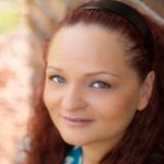 Headshot of Jessica Victoria, real estate agent