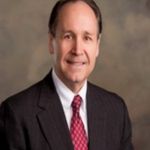 Headshot of Mark Wilkinson, real estate agent
