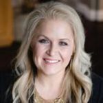 Headshot of Erin Swenson, real estate agent