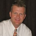 Headshot of Shawn Reed, real estate agent