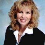 Headshot of Pamela Cunningham, real estate agent
