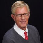Headshot of Bill White, real estate agent