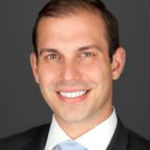 Headshot of George Simic, real estate agent