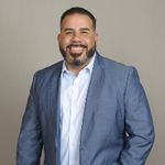 Headshot of Alex Pacheco, real estate agent