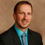Headshot of Nick Milici, real estate agent