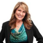 Headshot of Tina Clowes, real estate agent