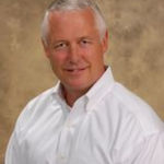 Headshot of Mike Seder, real estate agent
