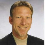 Headshot of Tom Himmler, real estate agent