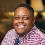 Headshot of Domonique Ayers, real estate agent