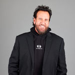 Headshot of Joel Carson, real estate agent