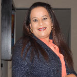 Headshot of Sylvia Valenzuela, real estate agent