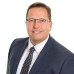 Headshot of Brad Lacher, real estate agent