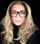 Headshot of Maurey Bell, real estate agent