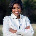 Headshot of Tiffany Dearman, real estate agent