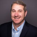 Headshot of Kelly Hummel, real estate agent