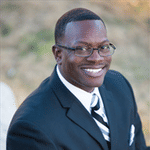 Headshot of Trenton Johnson, real estate agent