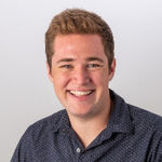 Headshot of Josh Giles, real estate agent