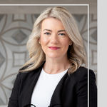 Headshot of Maria DelBoccio, real estate agent