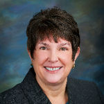 Headshot of Susan Webb, real estate agent