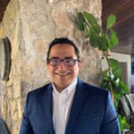Headshot of Israel Favela, real estate agent