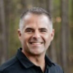 Headshot of Ryan Courson, real estate agent