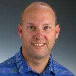 Headshot of Chris Luther, real estate agent
