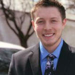 Headshot of Josh Farley, real estate agent
