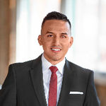 Headshot of Mauricio Lopez, real estate agent