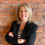 Headshot of Joy Jensen, real estate agent