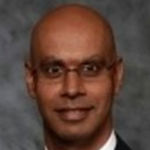 Headshot of Kalpesh Rami, real estate agent