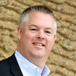Headshot of Jon Perkins, real estate agent