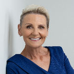 Headshot of Joanie Heighes, real estate agent