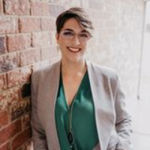 Headshot of Kara Whalin, real estate agent