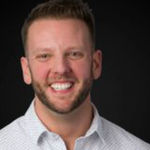 Headshot of Chris Ripperger, real estate agent