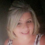 Headshot of Julie Cambier, real estate agent