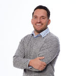 Headshot of Ryan Spiess, real estate agent