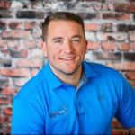 Headshot of Andrew Spangenberger, real estate agent