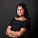 Headshot of Micky Kaur, real estate agent