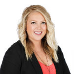Headshot of Heather Daniel, real estate agent