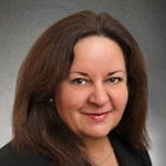 Headshot of Michele Marinelli, real estate agent