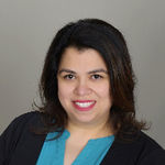 Headshot of Adelina Garza, real estate agent