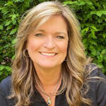 Headshot of Angie Wilkie, real estate agent