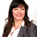 Headshot of Edilma Abby Loya, real estate agent
