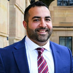 Headshot of Matin Haghkar, real estate agent