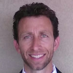 Headshot of Jay Natal, real estate agent